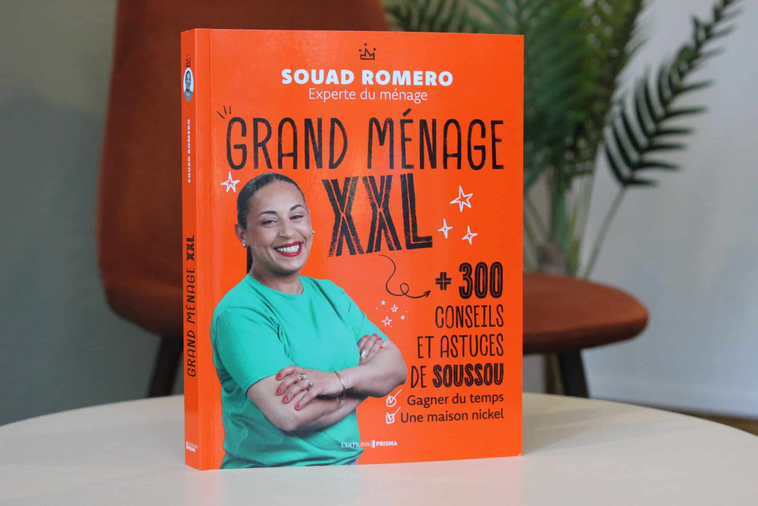 Exemplaire du livre "Grand Ménage XXL" par Souad Romero, experte du ménage, présentant plus de 300 conseils pour une maison impeccable.
